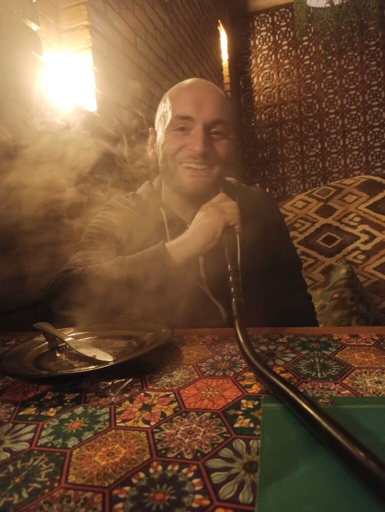 Fred enjoying Georgian wine and a hookah